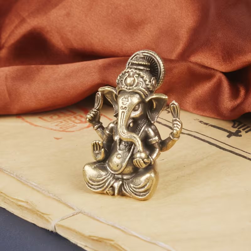 Traditional Solid Brass Lord Ganesha Statue – Miniature Golden-Tone Elephant God Figurine for Home, Office, and Temple Decor