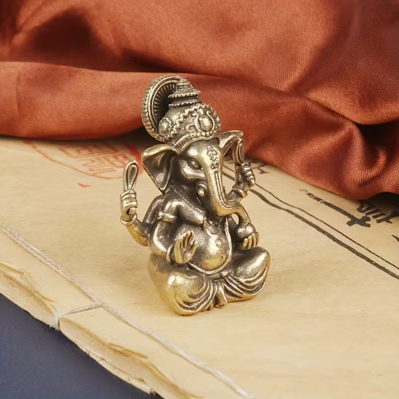 Traditional Solid Brass Lord Ganesha Statue – Miniature Golden-Tone Elephant God Figurine for Home, Office, and Temple Decor