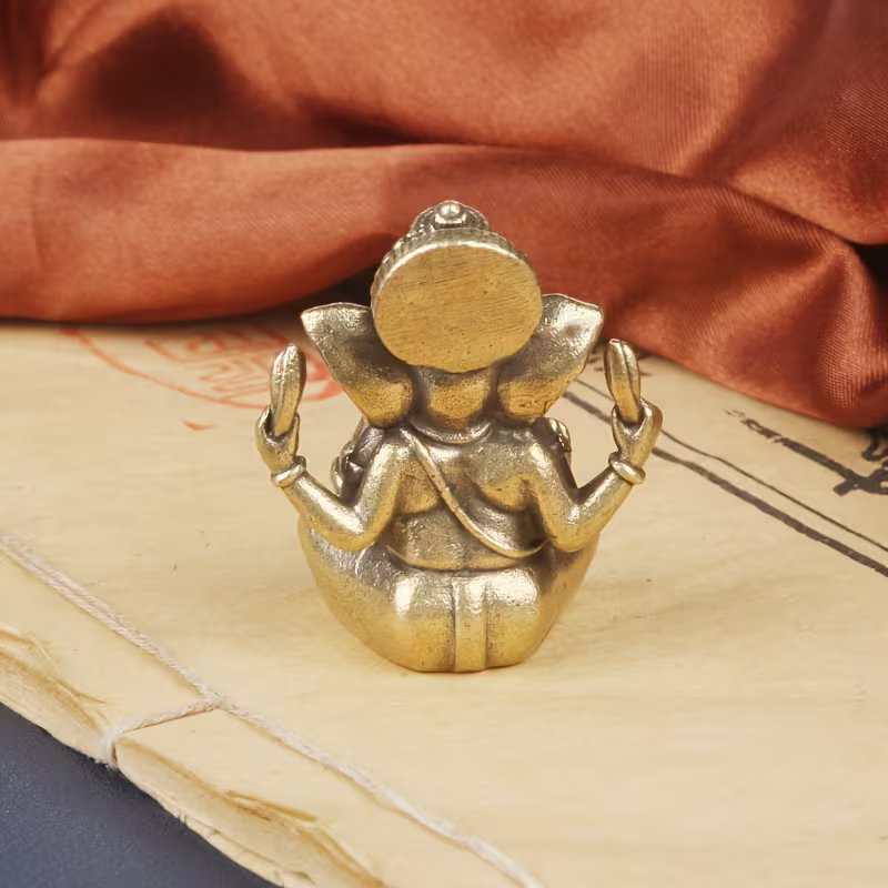 Traditional Solid Brass Lord Ganesha Statue – Miniature Golden-Tone Elephant God Figurine for Home, Office, and Temple Decor