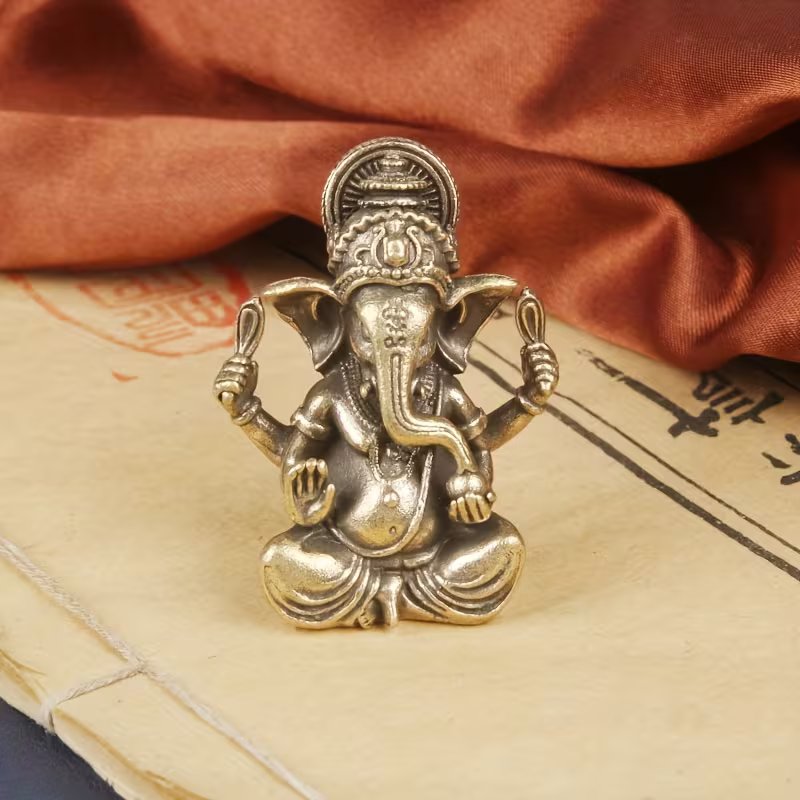 Traditional Solid Brass Lord Ganesha Statue – Miniature Golden-Tone Elephant God Figurine for Home, Office, and Temple Decor